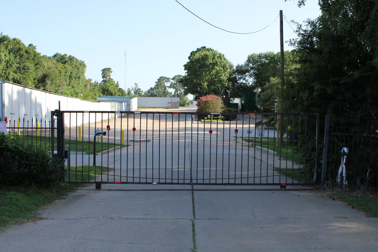 Secure gate across the driveway into the facility