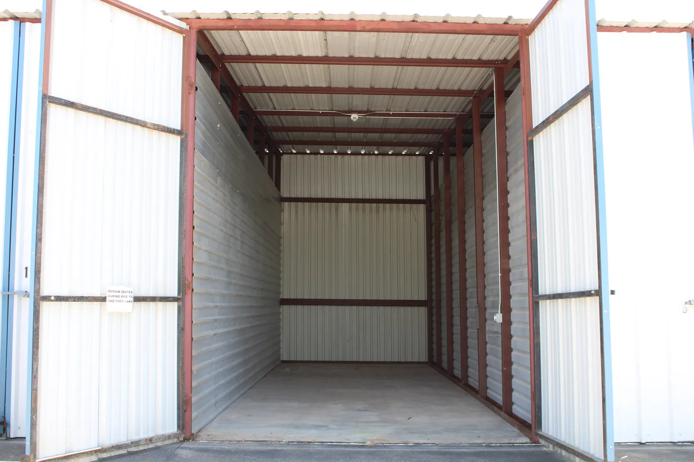 Inside a compact enclosed boat stall