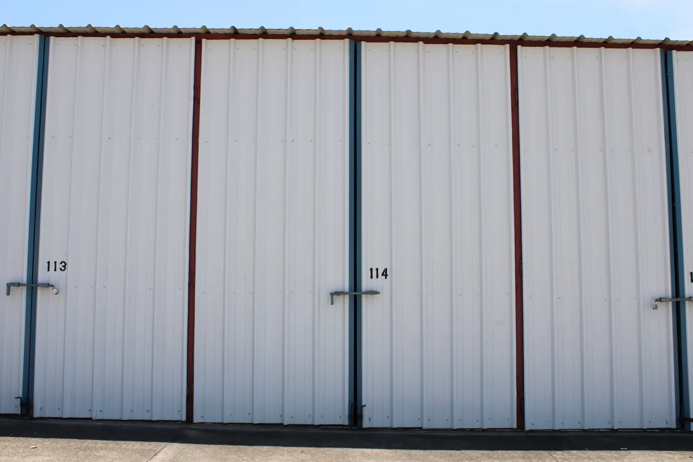 Numbered storage stall door 114 at E-Z Boat Storage