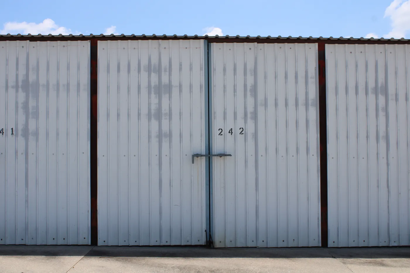 Numbered storage stall door 242 at E-Z Boat Storage