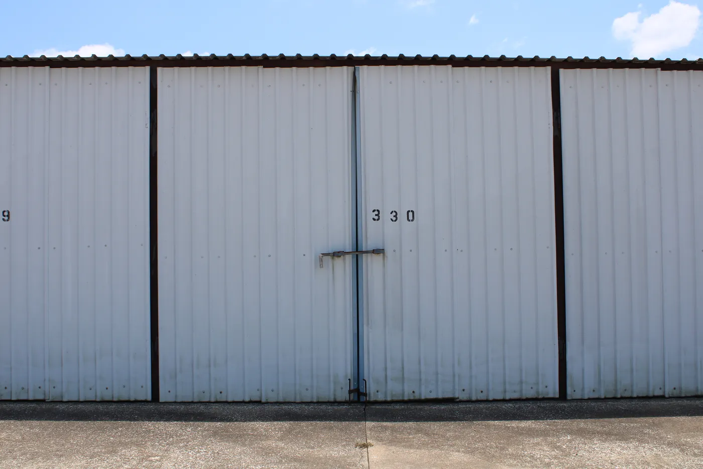 Numbered storage stall door 330 at E-Z Boat Storage
